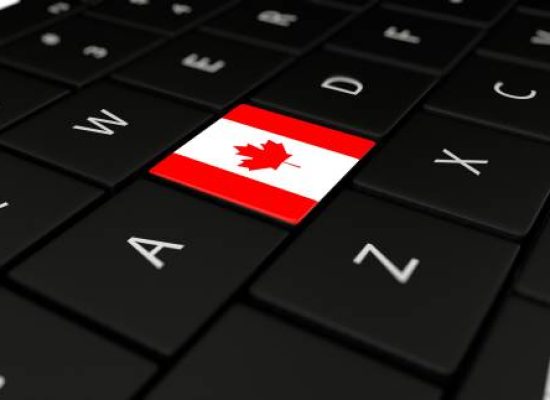 3D rendering close up of Canada flag button on laptop keyboard.
