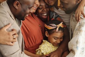 Photo by August de Richelieu on <a href="https://www.pexels.com/photo/family-gathering-for-a-group-hug-4262424/" rel="nofollow">Pexels.com</a>