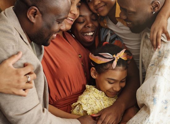 Photo by August de Richelieu on <a href="https://www.pexels.com/photo/family-gathering-for-a-group-hug-4262424/" rel="nofollow">Pexels.com</a>