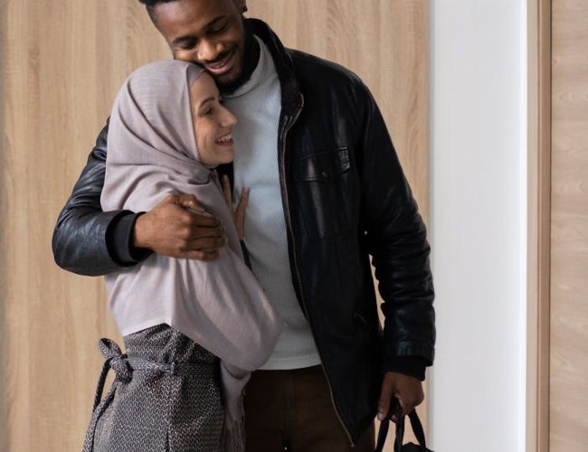 happy diverse couple hugging at home