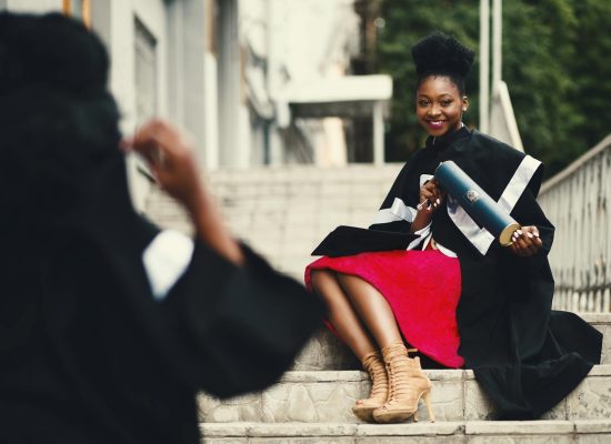 Photo by Godisable Jacob on <a href="https://www.pexels.com/photo/woman-wearing-black-graduation-coat-sits-on-stairs-901962/" rel="nofollow">Pexels.com</a>