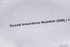 The phrase Social Insurance Number (SIN) on a document.