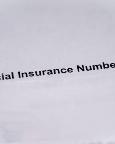 The phrase Social Insurance Number (SIN) on a document.