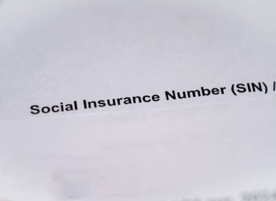 The phrase Social Insurance Number (SIN) on a document.